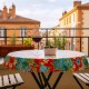 Exotic floral round tablecloth on a balcony - Casa Frida