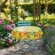 Nappe ronde Fresas 90 cm, sur une petite table de jardin, jaune - Casa Frida